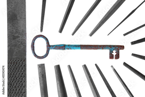 group of vintage metal files teamwork making big key