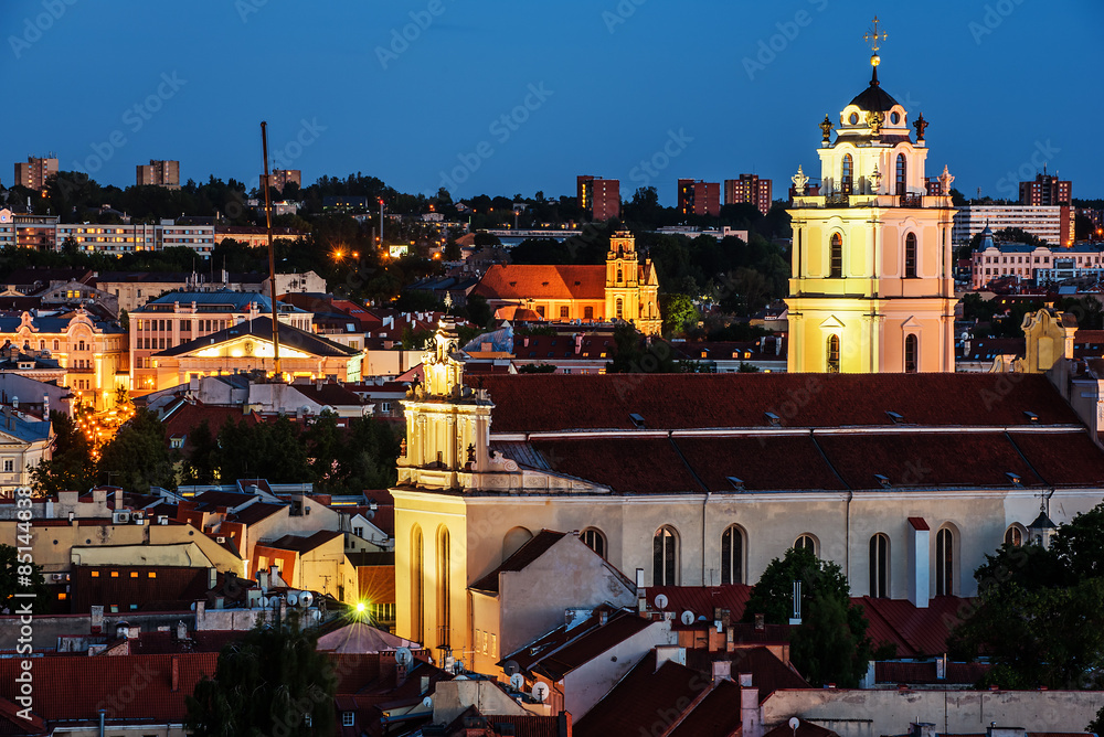 Aerial night panorama of Vilnius, Lithuania. Sts Johns Church