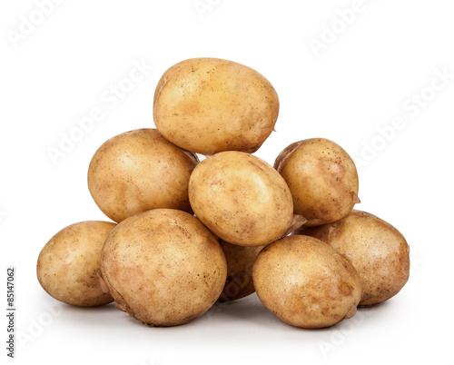 heap of young potatoes isolated on white background