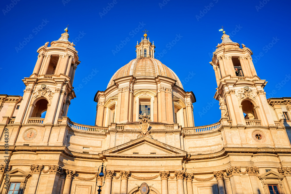 Rome, Italy. Sunrise in Piazza Navona in Roma with the church of Sant'Agnese in Agone.