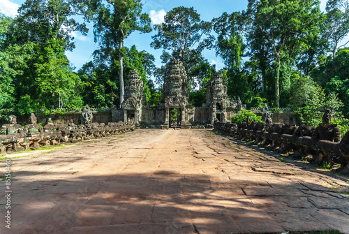 sight of the entry and of the gopuras of the archaeological enclosure of preah khan, siam reap, cambodia photo