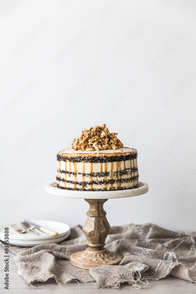 Cake on cake stand against white background Stock Photo | Adobe Stock