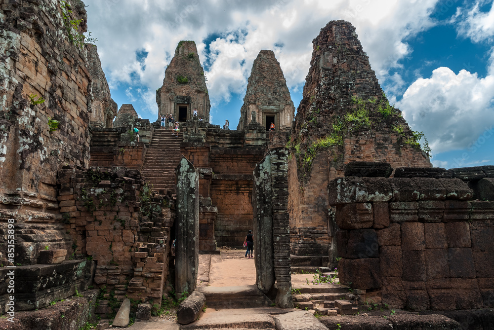 sight of the central prasat from a library in ruins in the archaeological pre rup place in siam reap, cambodia