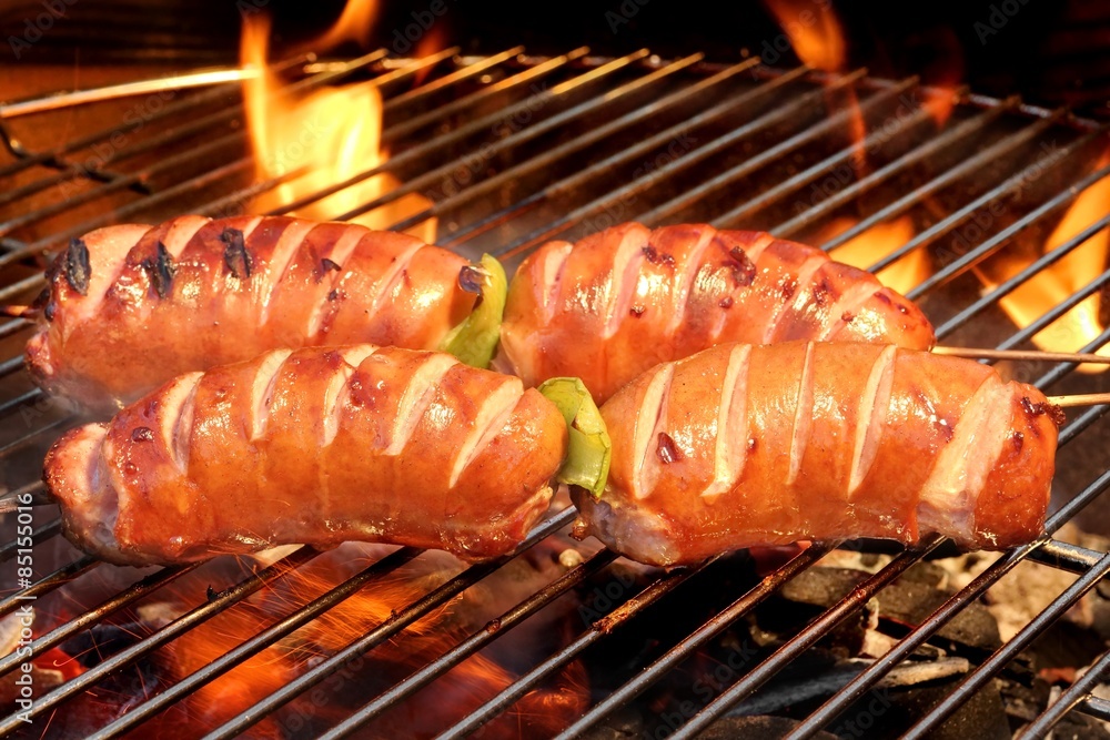 Fatty Sausages On The Hot Barbecue Flaming Charcoal Grill Fatty Sausages On The Hot Barbecue Flaming Charcoal Grill