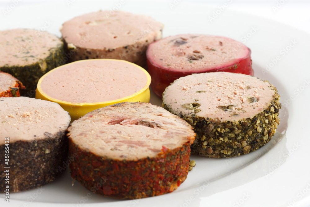 Portions of round pates on plate. Detail. Portions of round pates on plate. Detail.
