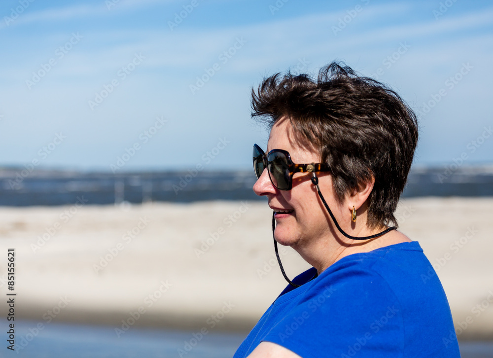 Woman Smiling on Beach Woman Smiling on Beach