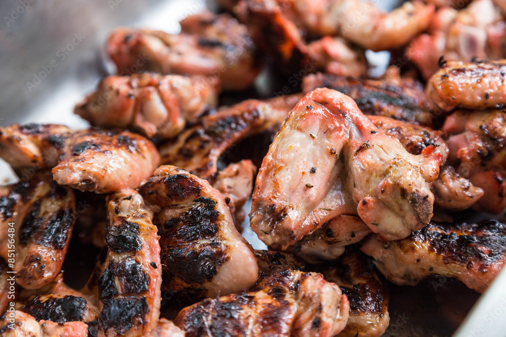 juice marinated chicken wings on barbecue