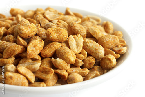 Wallpaper Mural Spicy dry roasted peanuts in white bowl. Isolated. Torontodigital.ca