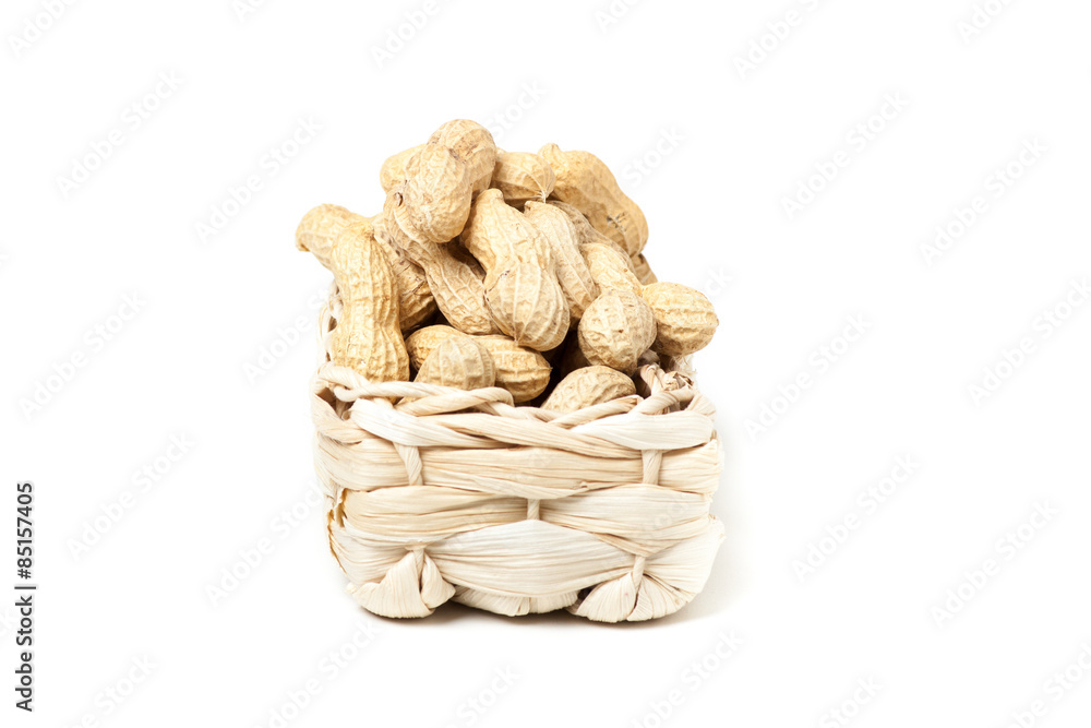 peanuts isolated in basket on white background peanuts isolated in basket on white background
