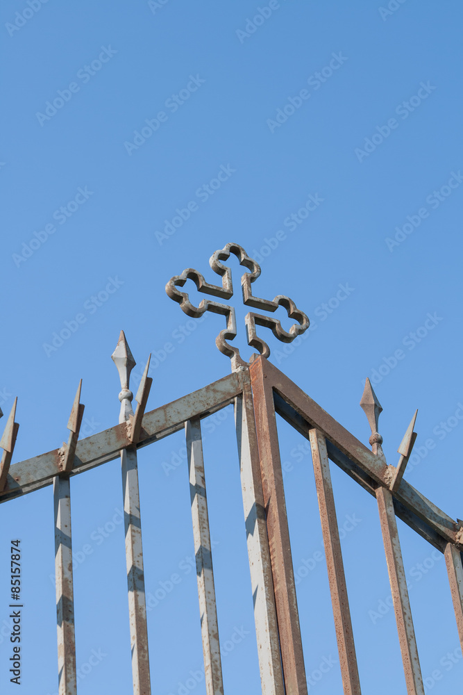 gate with cross from metal on air