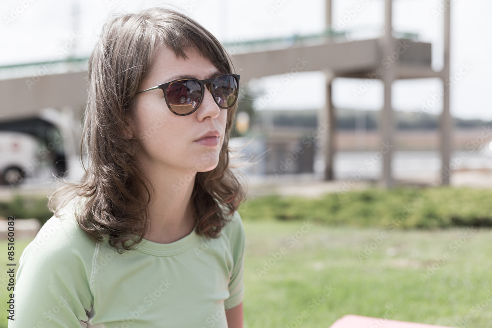 Young woman in dark glasses portrait. Young woman in dark glasses portrait.