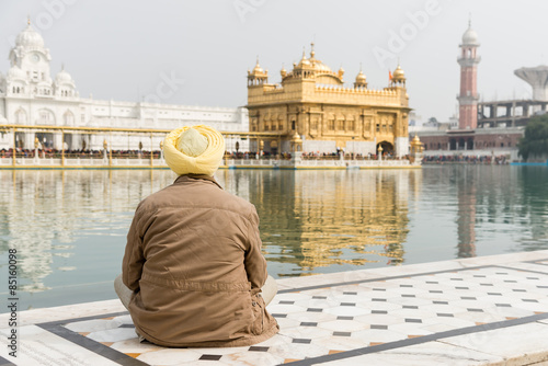A lone male sikh pilgrim at Golden Temple,  Amritsar.