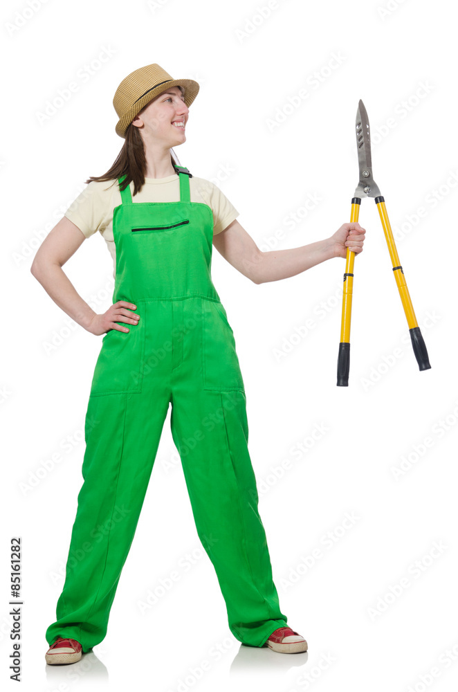 Young woman with shears on white