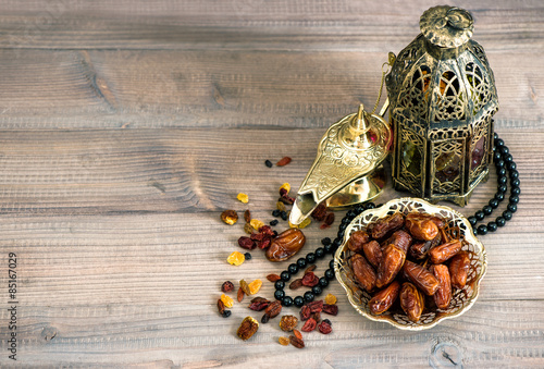 Dates, arabic lamps and rosary. Islamic holidays decoration