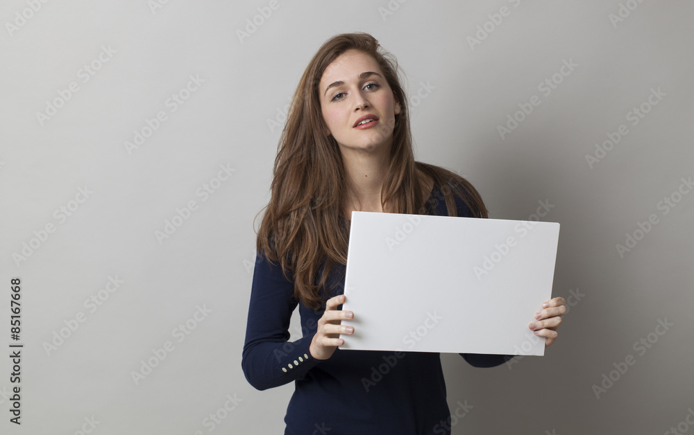 young female student holding a blank board for searching for a job young female student holding a blank board for searching for a job