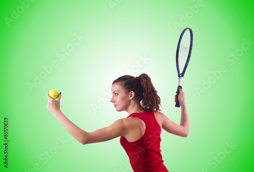 Woman playing tennis against the gradient © Elnur
