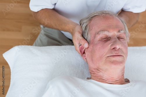 Man receiving neck massage 