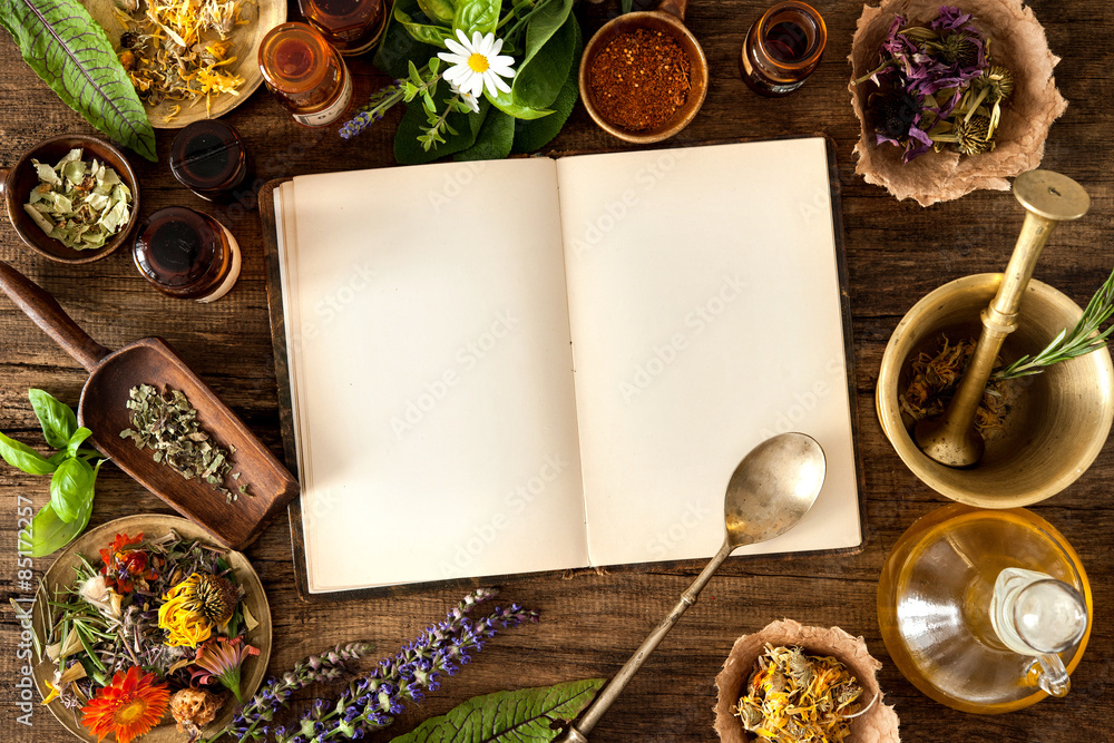 Ancient natural medicine, herbal, vials and recipe book on wooden background - obrazy, fototapety, plakaty 