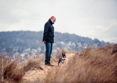 Man with Boston Terrier © Nailia Schwarz