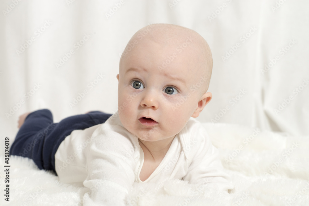 Beautiful Baby Boy with White Background & Blanket in Studio Beautiful Baby Boy with White Background & Blanket in Studio