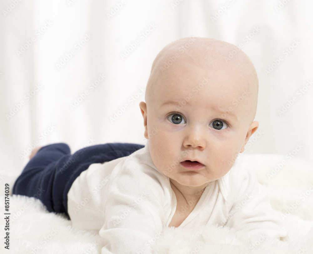 Beautiful Baby Boy with White Background & Blanket in Studio Beautiful Baby Boy with White Background & Blanket in Studio