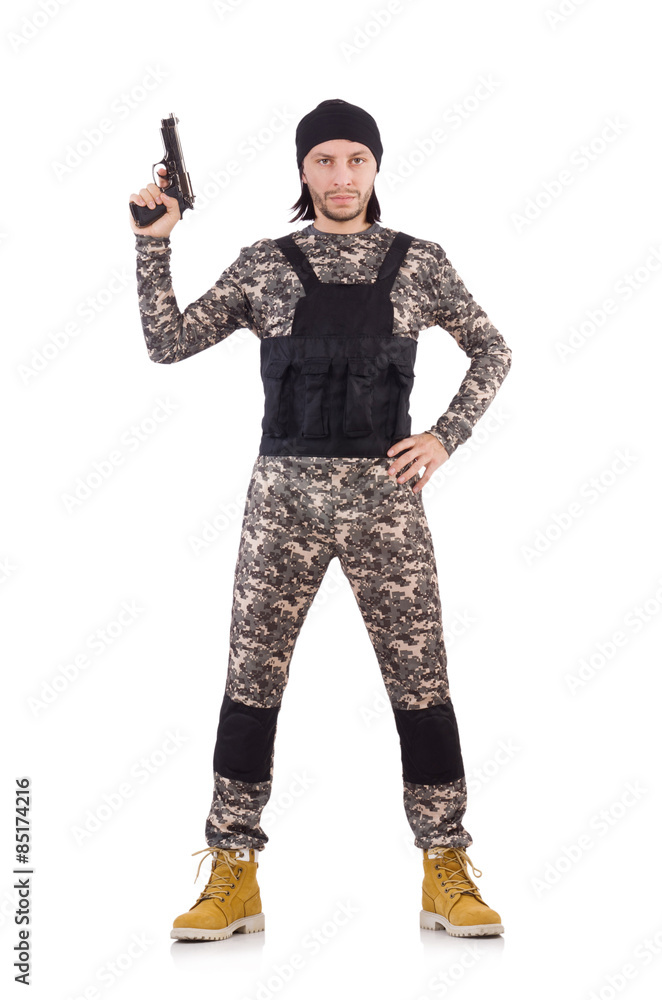 Young man in military uniform holding pistol isolated on white