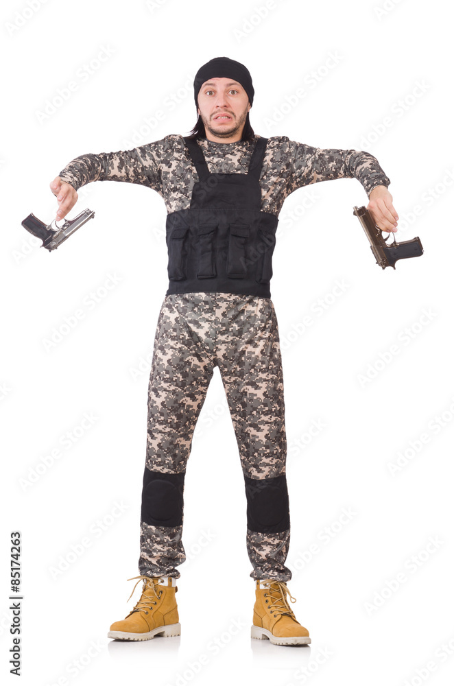 Young man in military uniform holding gun isolated on white Young man in military uniform holding gun isolated on white