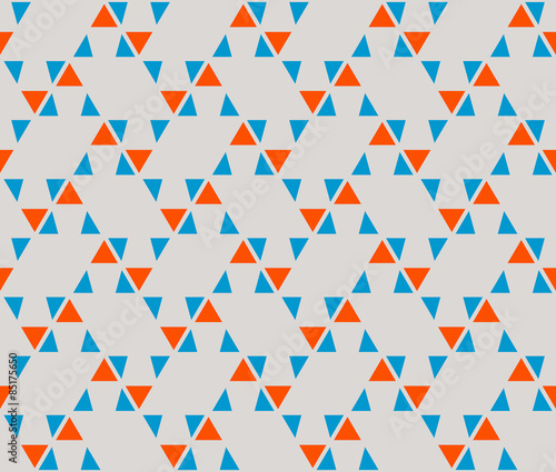 Blue and orange color minimal triangle on gray color background seamless pattern vector.
