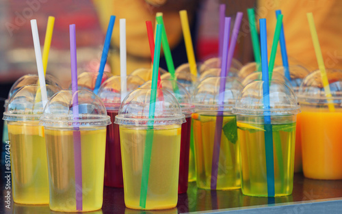 vivid drink in plastic glasses