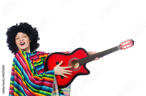 Pretty girl in mexican poncho with guitar isolated on white