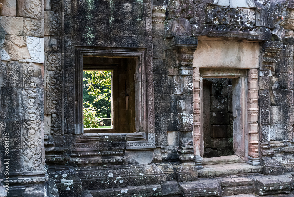 bas-reliefs, door and window of the prasat of the temple of chau say tevoda in siam reap, cambodia