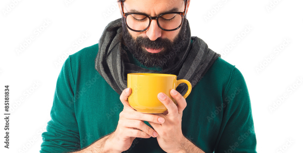 Man holding a cup of coffee Man holding a cup of coffee