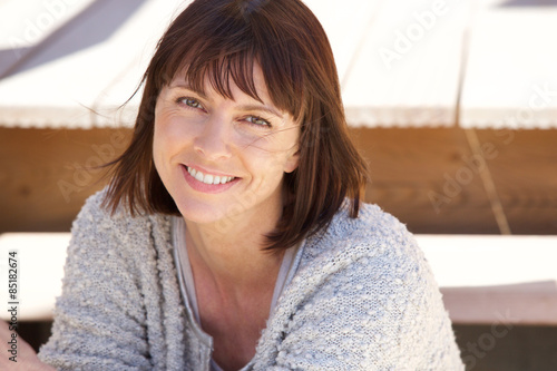 Fotografie Healthy older woman smiling outside