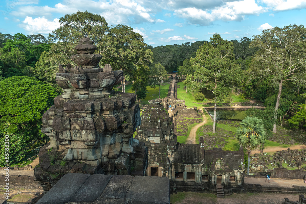 sight of the gopura of the exterior enclosure, of the roadway and the ponds of the baphuon in the archaeological angkor thom place in siam reap, cambodia