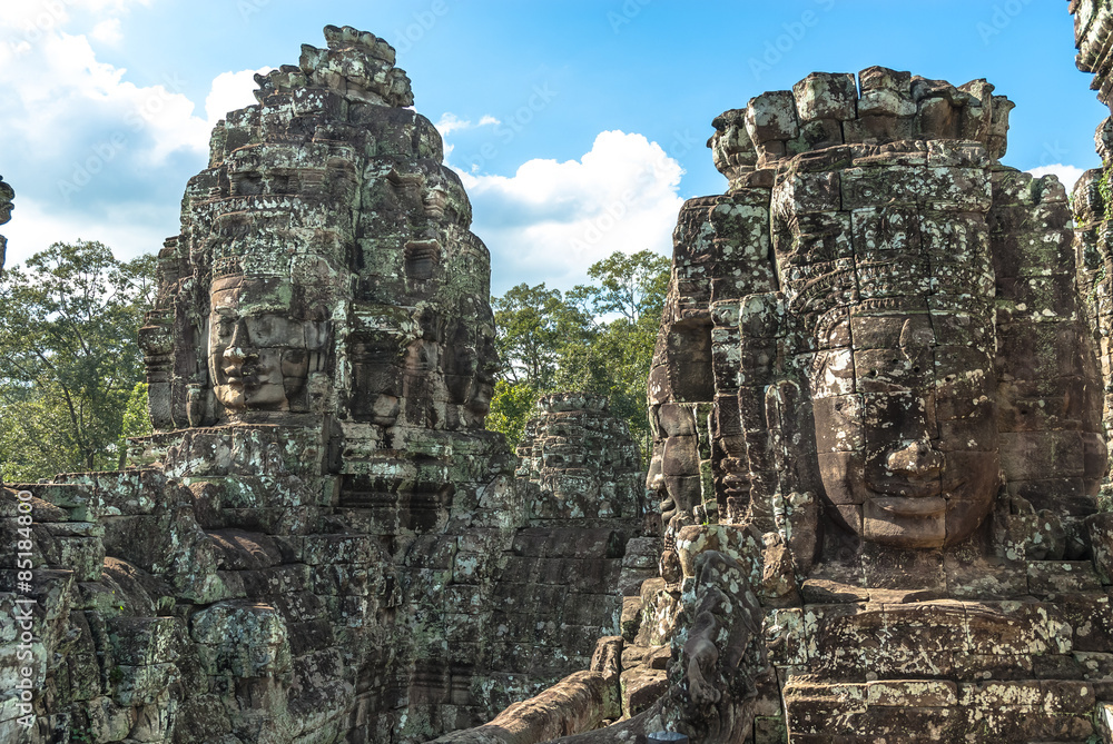 towers as metaphor of the mount meru with the head of lokeshvara and the face of jayavarman VII in the complex of the bayon in the archaeological angkor thom place in siam reap, cambodia