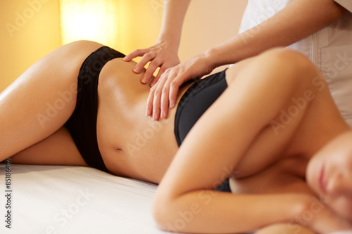Spa Woman. Close-up of a Woman Getting Spa Treatment. Body Massage