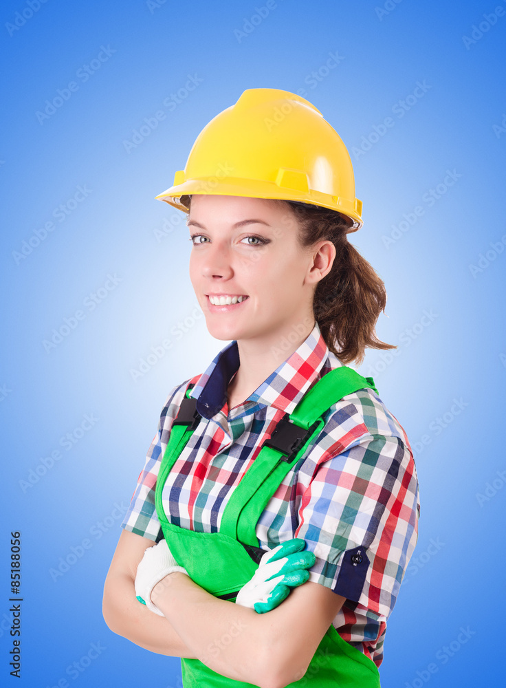 Woman builder against the gradient Woman builder against the gradient
