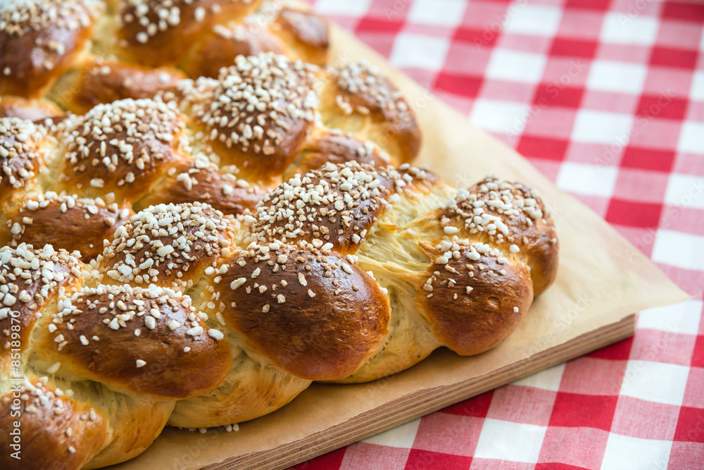 Freshly baked sweet braided bread loafs