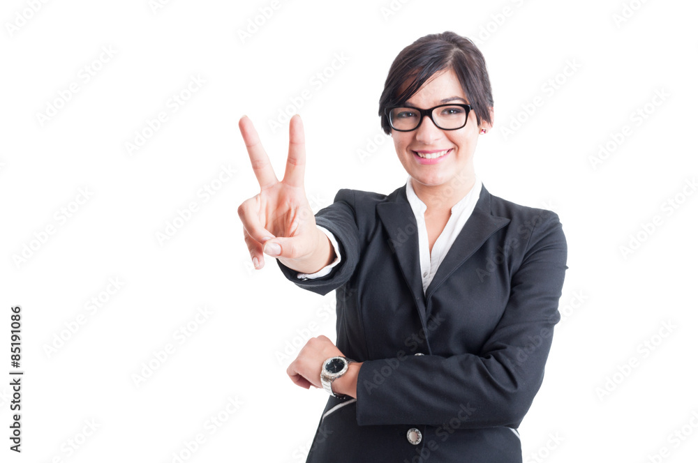 Business woman showing victory or number two Business woman showing victory or number two