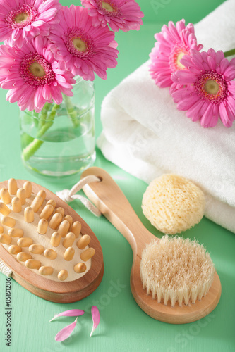 spa aromatherapy with gerbera flowers sponge brush