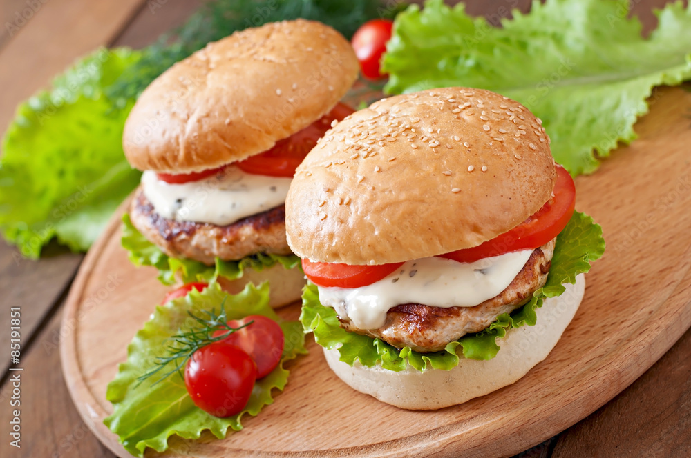 Appetizing hamburger with chicken burger and sauce Tartar Appetizing hamburger with chicken burger and sauce Tartar