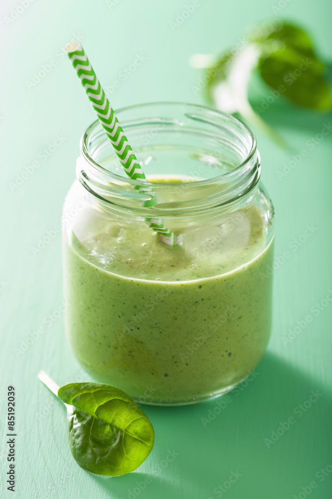healthy green smoothie with spinach mango banana in glass jar healthy green smoothie with spinach mango banana in glass jar