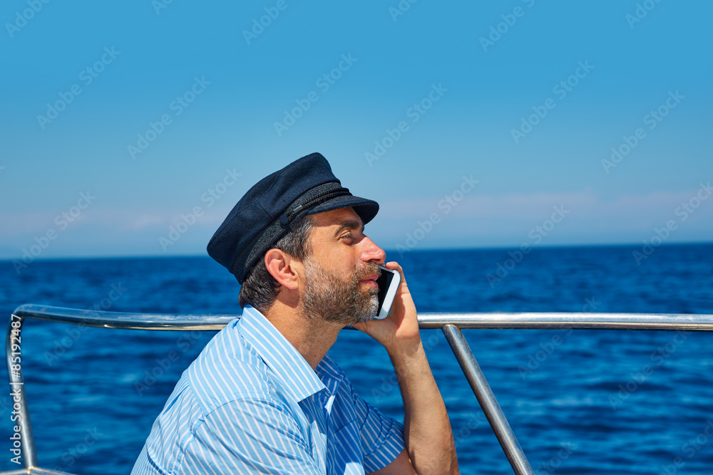 Captain cap sailor man talking mobile phone boat Captain cap sailor man talking mobile phone boat