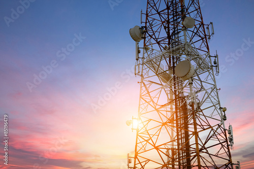Fotografia Satellite dish telecom network at sunset communication technolog
