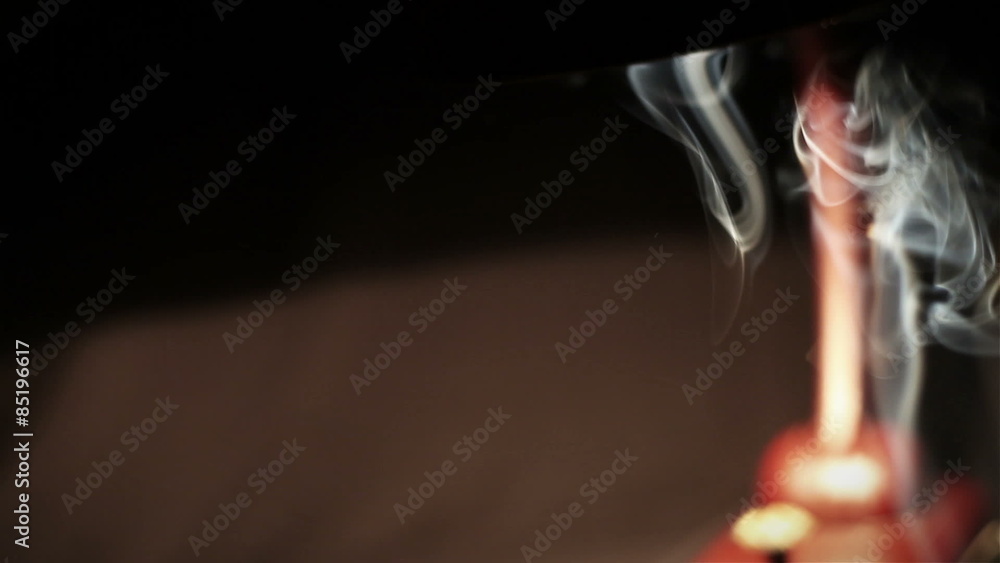 Pipe / cigar smoke under the night desktop lamp