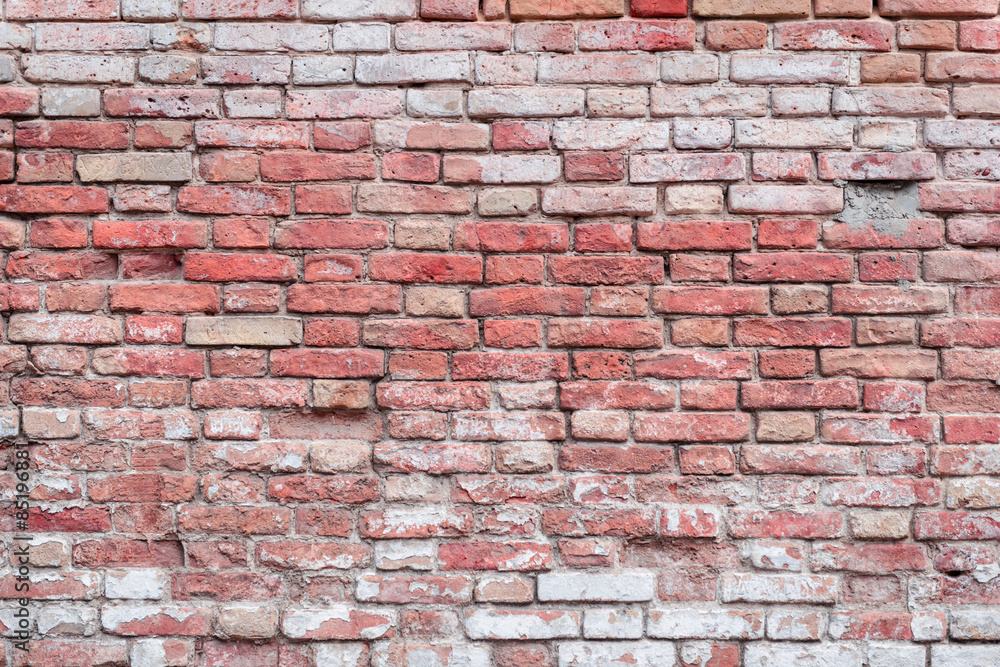 Fototapeta premium Texture. Brick. Wall. A background with attritions and cracks