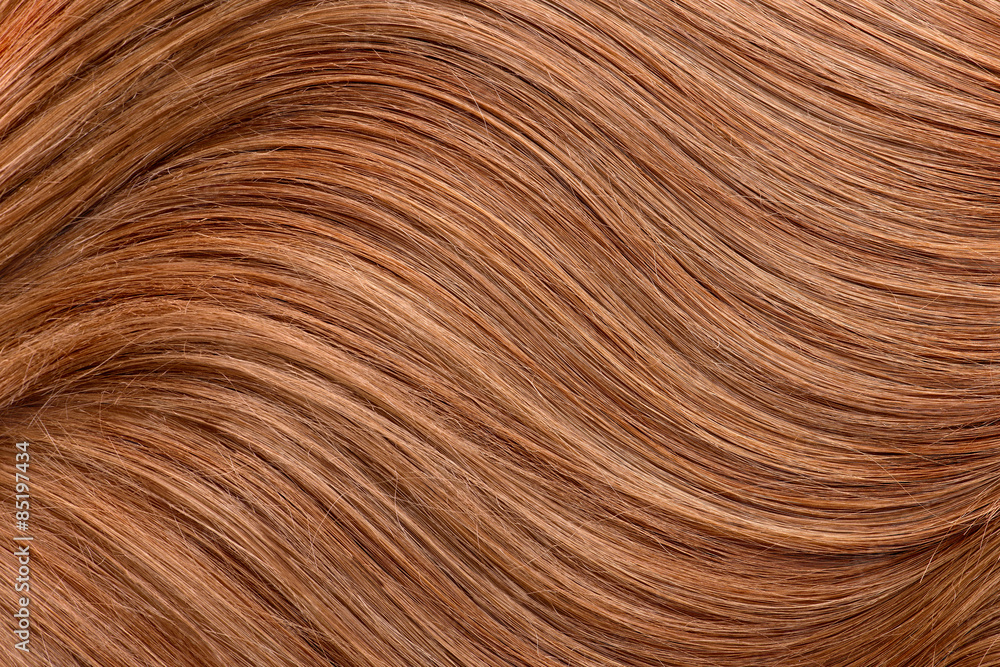 Long red human shiny hair / Wavy red human hair background Long red human shiny hair / Wavy red human hair background
