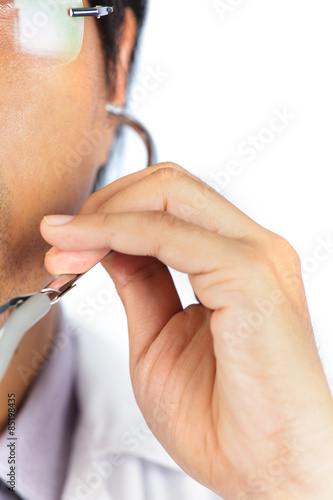 Doctor using a stethoscope