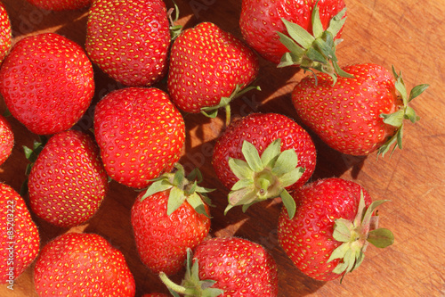 Strawberries on wood board