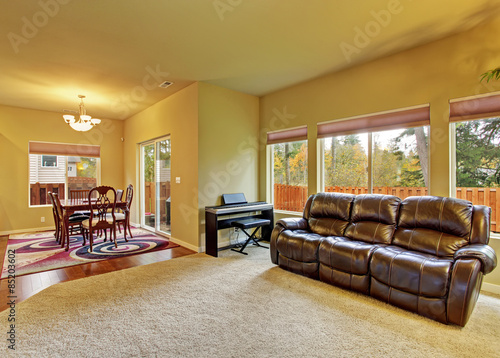 Cozy living room with carpet, and fireplace.